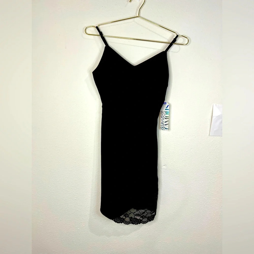 🆕 Almost Famous Black Sleeveless Dress with Bottom Lace Accent